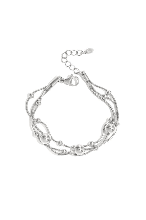 Armband met kettingen en polkadots