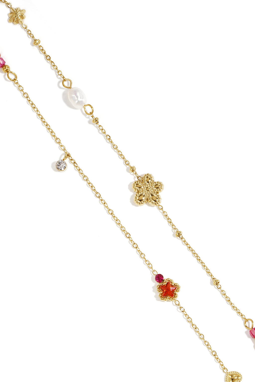 Charm bracelet with star and flower charms, pearls, stones and beads