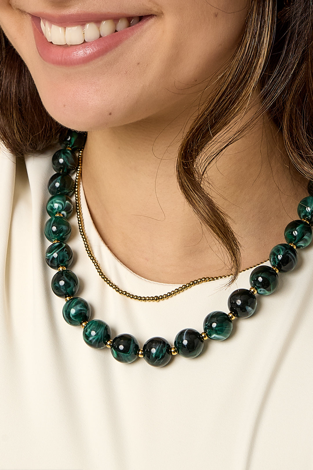 Kralenketting met goude kraaltjes tussendoor 13.5mm