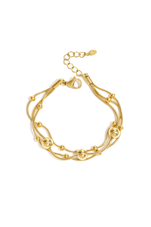 Armband met kettingen en polkadots
